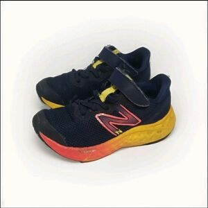 New Balance Fresh Foam Arishi v4  Kids Size 11.5  Blue/Red/ Yellow Maintained.